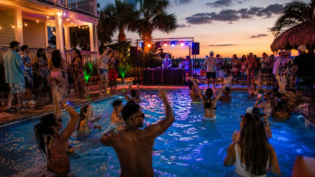 Guests enjoying poolside DJ entertainment at a Myrtle Beach resort